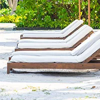 Pool lounger deck at Clove County Noida